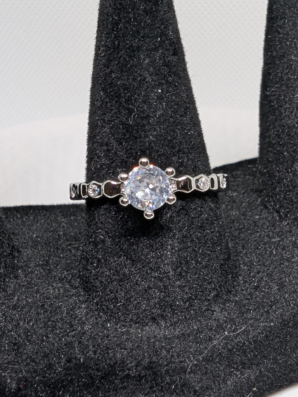 Sterling Silver CZ Solitaire Ring with Accent Stones - White